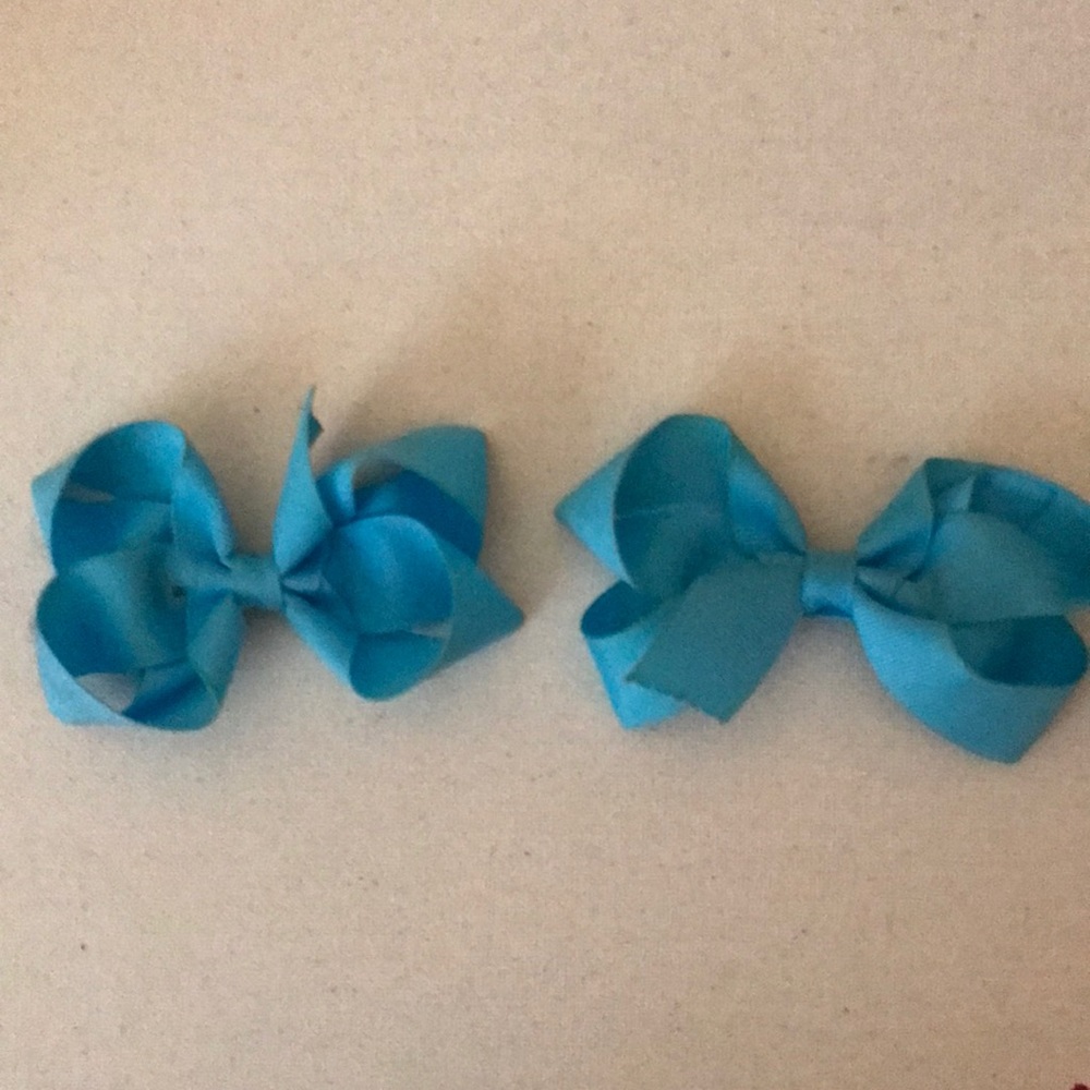 Tiny two blue matching bows